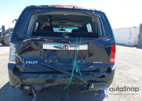 2014 Honda Pilot Touring z USA, uszkodzony, nr VIN 5FNYF3H97EB008210